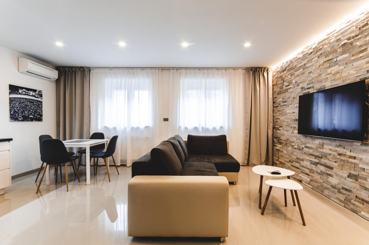 Silesia Residence Ostrava Exterior photo A living room with a television